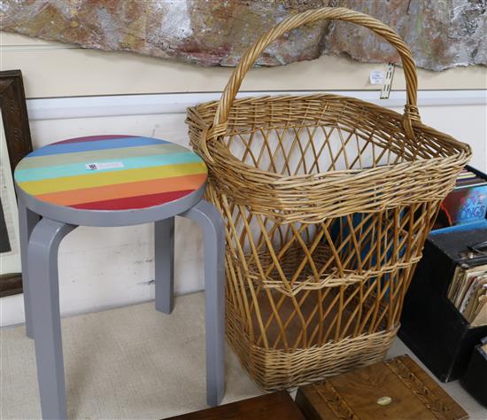 A wicker basket and a painted stool